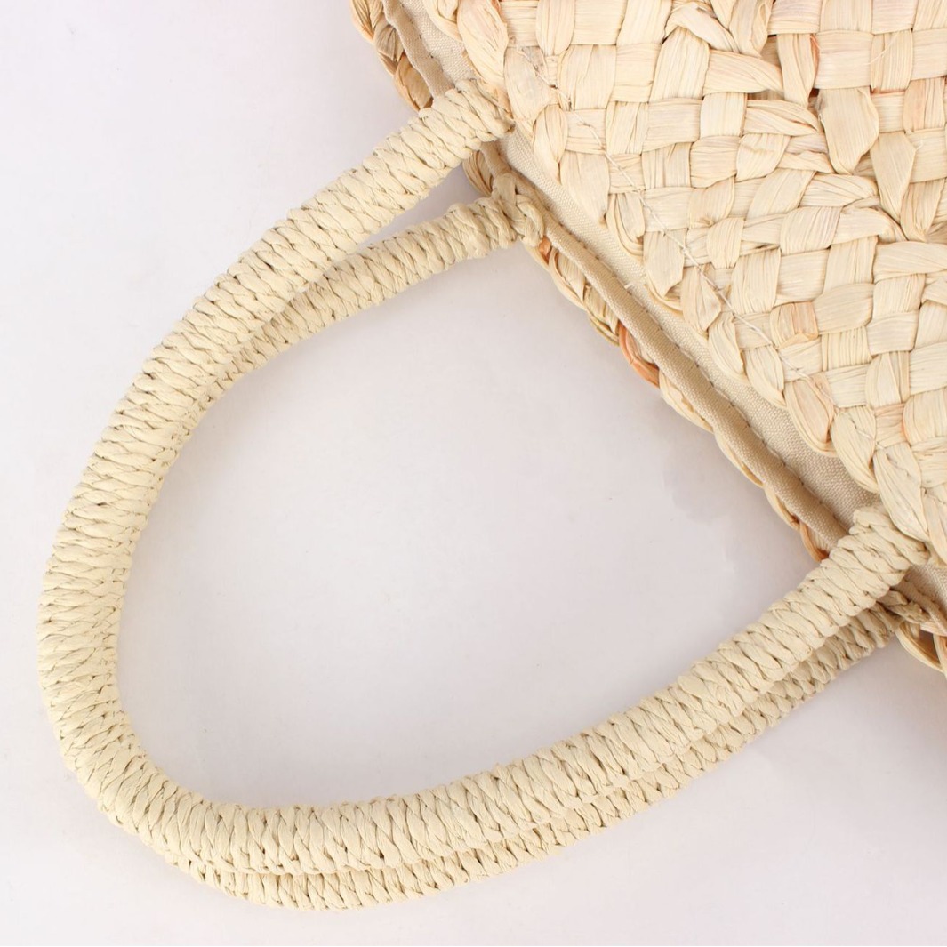 One-piece delivery of cute corn husk hand-held straw woven bags, new hand-held straw woven bags, women's seaside vacation beach Item Picture