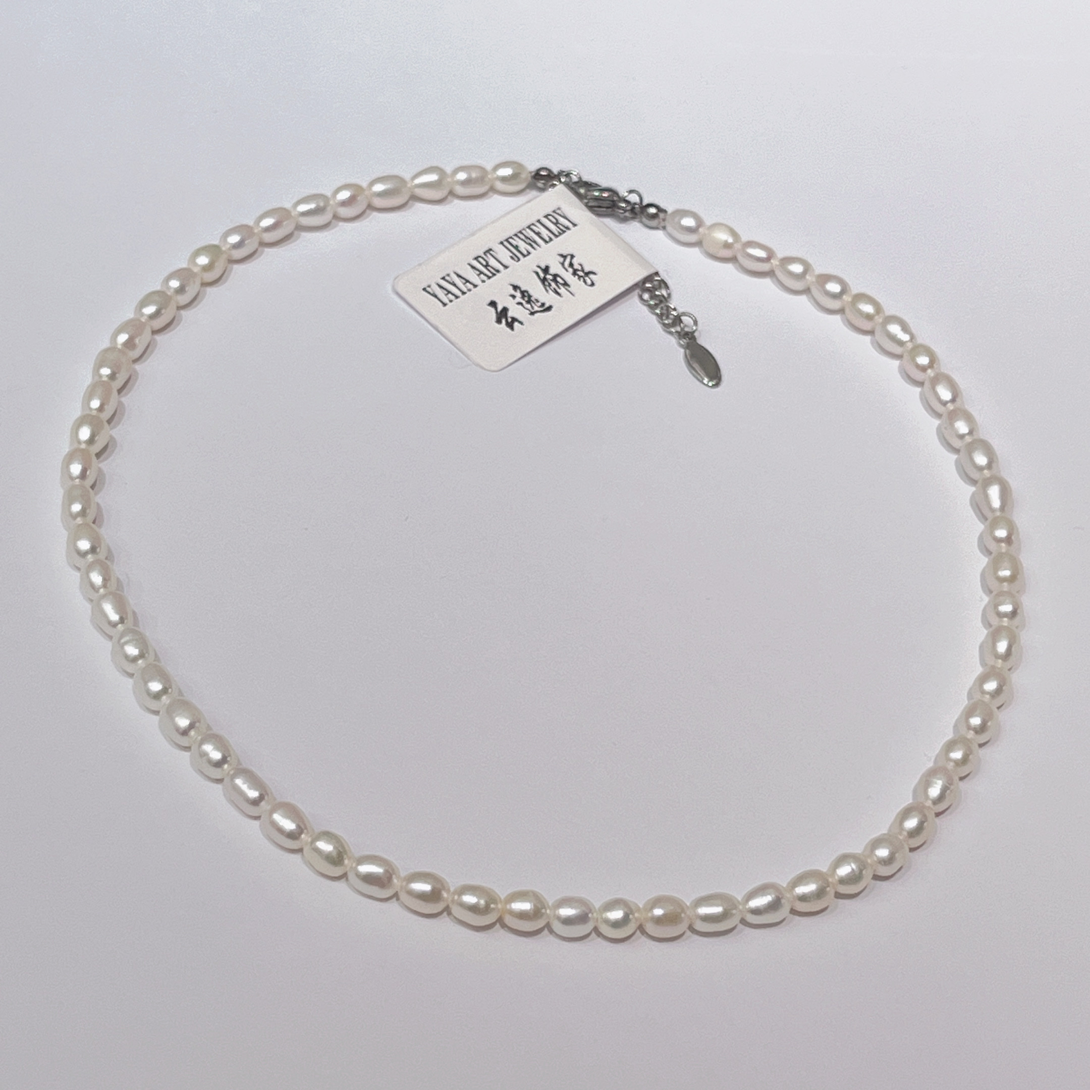 Yunyi decoración inicio blanco 4-5mm forma de arroz perla de agua dulce cadena de clavícula amante blanco noble collar de perlas de agua dulce al por mayor fuente fabricante details Picture