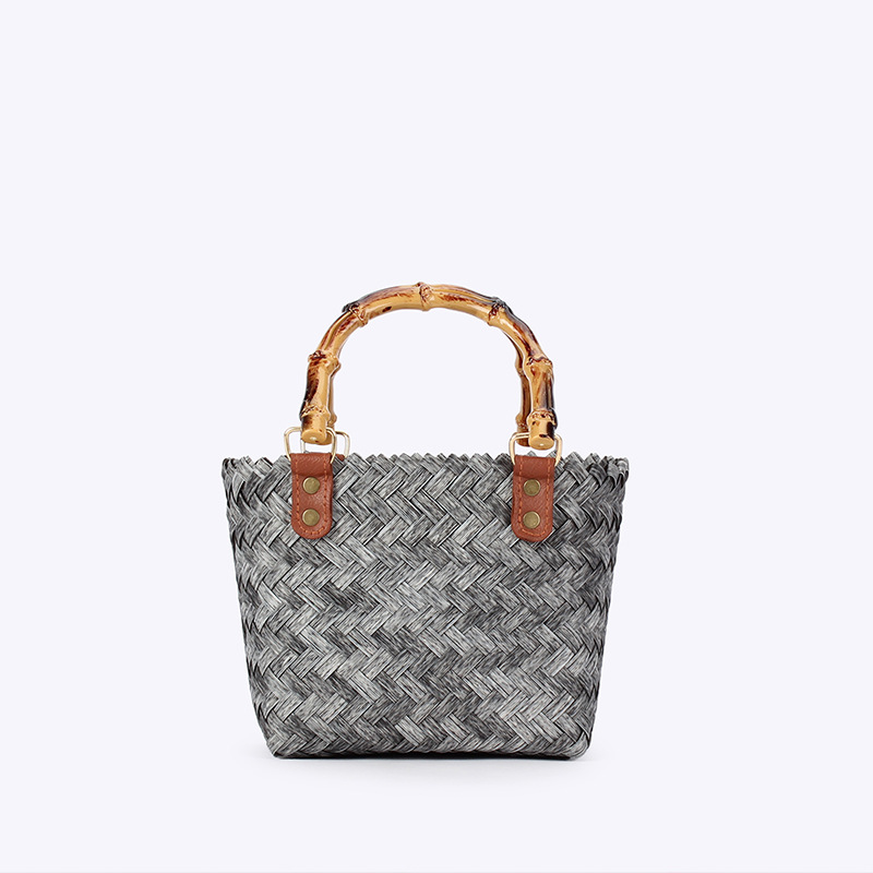 A new summer style of artistic and retro bamboo joint handle handbag for women, a niche and fashionable women's bag imitating rattan and bamboo joint handle