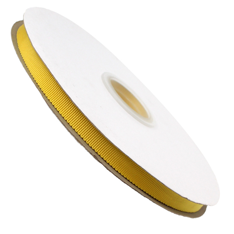 The manufacturer offers a large quantity of 1cm multi-color polyester hat strap with a special discount. The gift box decoration can be made into a solid color woven strap with a bow Application Scenario