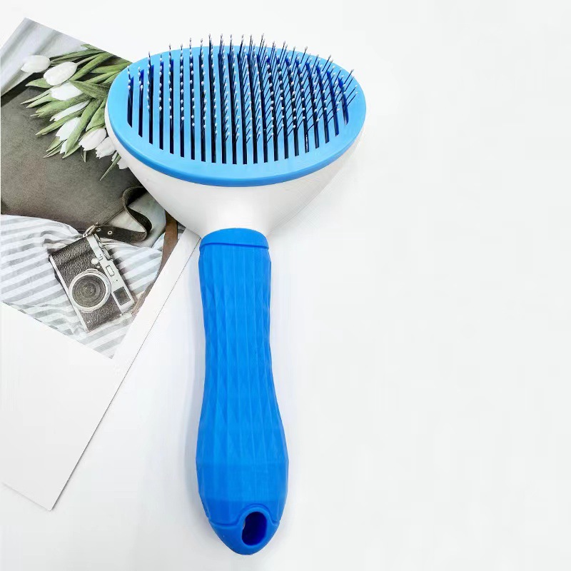 宠物梳子/宠物用品/硅胶宠物去毛梳/宠物刷子/宠物猫毛梳子开结梳白底实物图