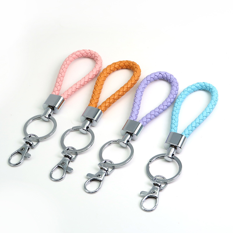 Wholesale of small gifts for hand-woven leather rope keychains, dog buckles, door buckles, key chains and card holders Application Scenario