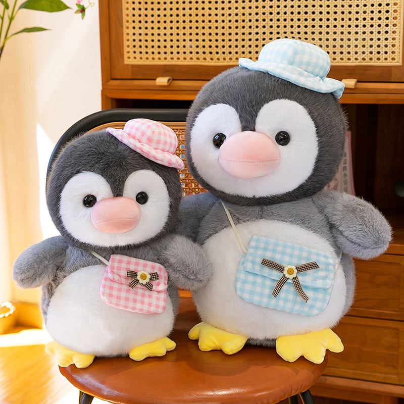 New cross-border super cute penguin team plush toy figurines, adorable shoulder bags, goose dolls, Ocean Park gifts details Picture
