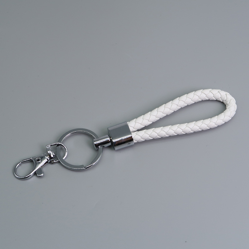 Wholesale of small gifts for hand-woven leather rope keychains, dog buckles, door buckles, key chains and card holders Item Picture