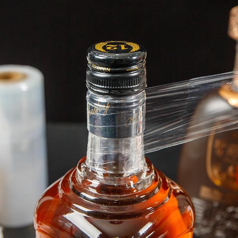 外卖打包膜缠绕膜工业拉伸嫁接膜透明密封防撒漏封口膜封酒膜保鲜产品图