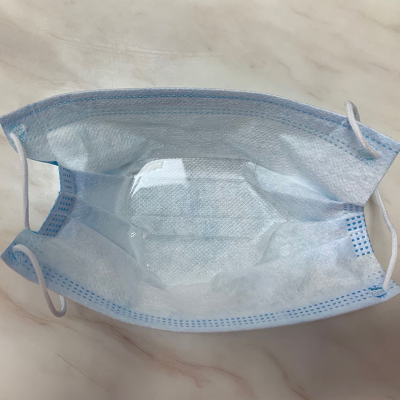 现货一次性三层无纺布口罩带熔喷布口罩兰色三层一次性防护口罩白底实物图
