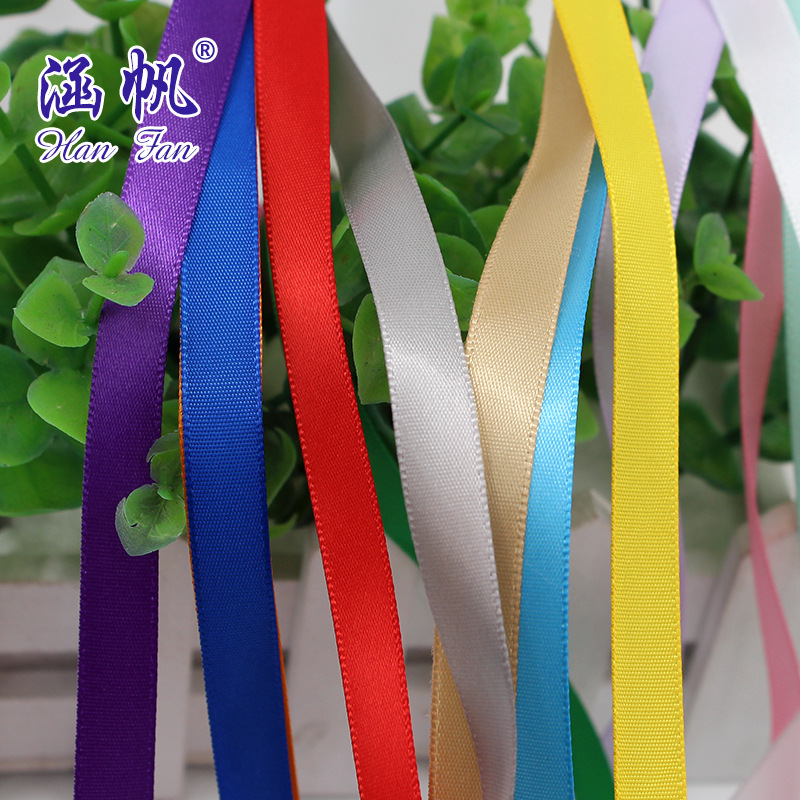 Colorful ribbons, ribbon rolls, festival paper decorations, honeycomb balls, wedding decorations, colorful stripes, decals, wedding supplies details Picture
