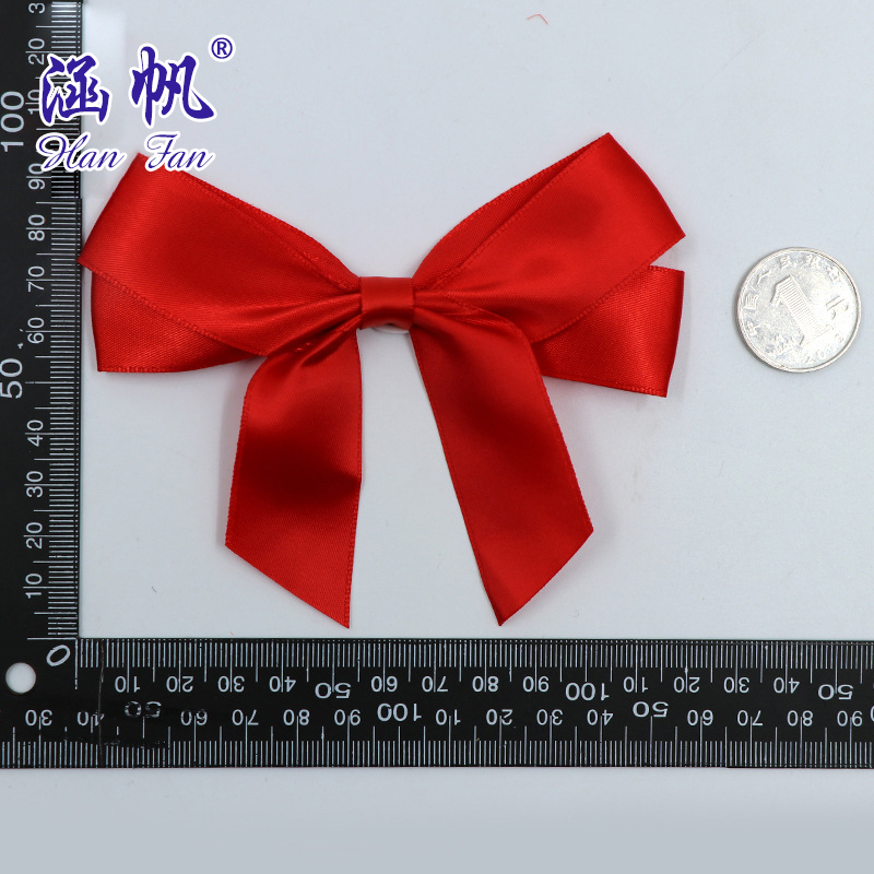 A professional bow manufacturer supplies high-end golden polyester ribbon bows with double-sided tape decoration gift boxes