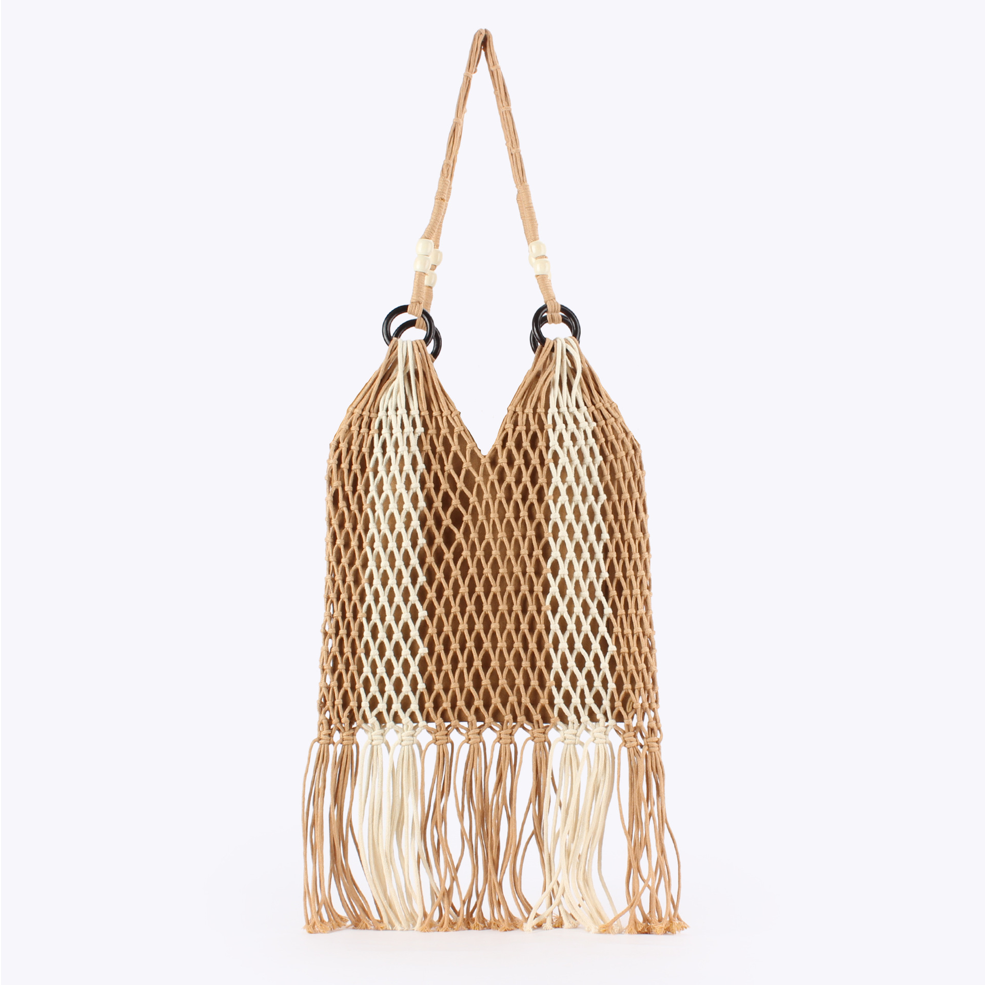 The new hand-woven bag with hollowed-out tassels is a versatile choice for daily wear and a seaside vacation photo shoot for ladies full image