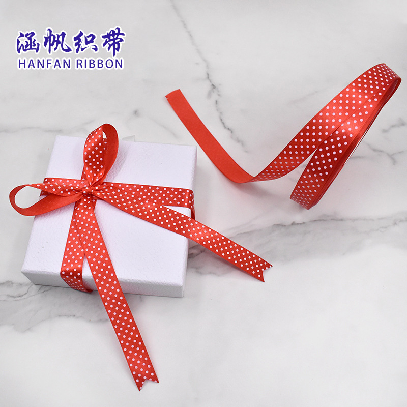 Wedding colorful polka dot ribbons, ribbon rolls, festival paper decorations, honeycomb balls, colored stripes, latte art decorative items, wedding arrangements details Picture