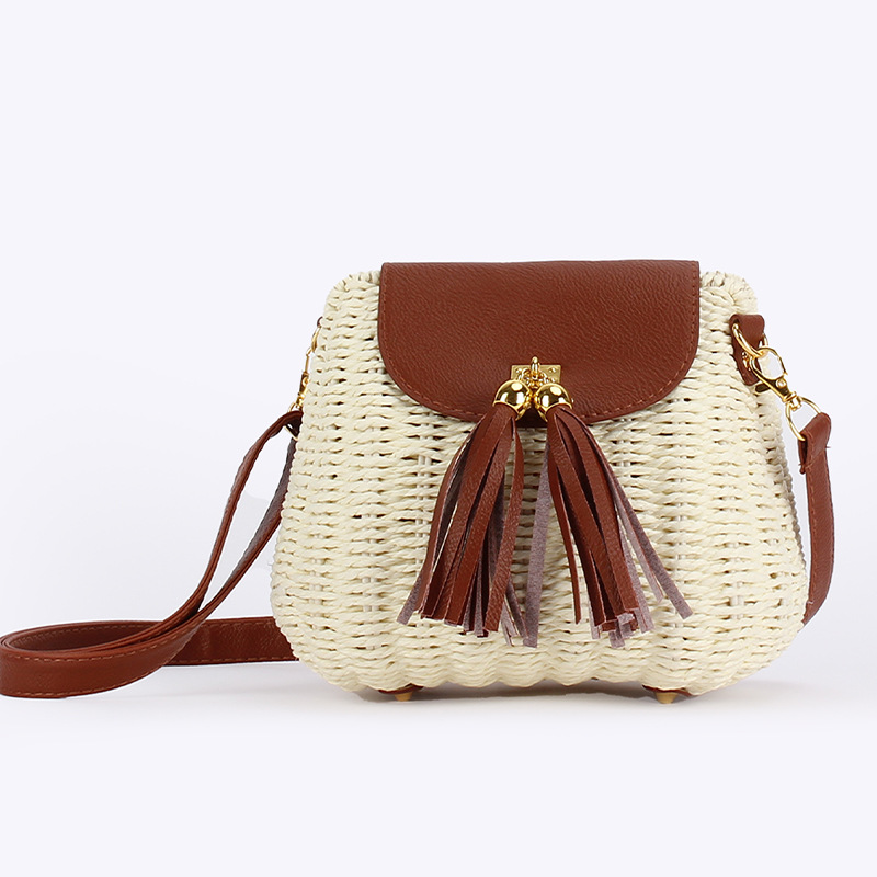 A new, fresh and simple, slanted paper rope woven bag for beachfront and beach vacation, casual and unique women's bag