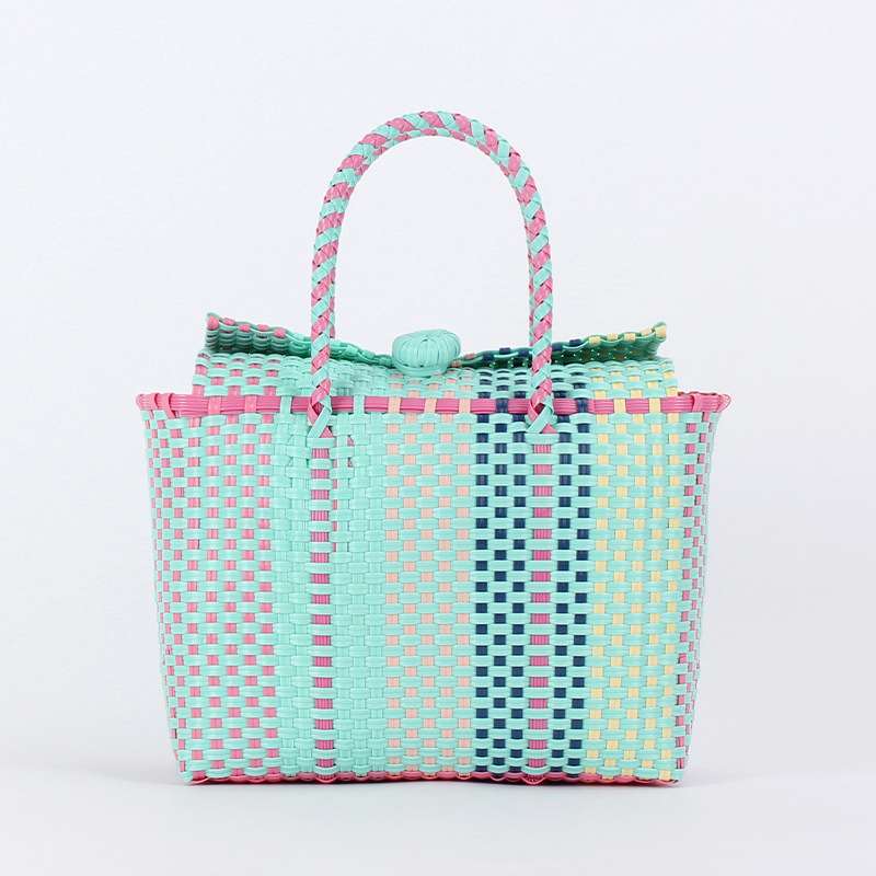 One-piece delivery of new fresh and contrasting color hand-woven bags, plastic baskets, beach vacation picnic hand-carried ladies' bags full image