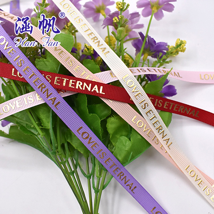 تم تصميم مجموعة مختلفة من أشرطة طابعات اللوغو المزخرفة على 3 3 CM من الحزام المطبوع الساخن details Picture