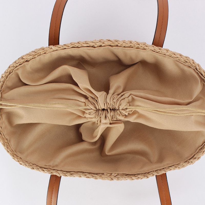 Brown leather hand-held bag with straw weaving, a small crossbody bag with artistic weaving and crocheted silver thread spliced together Specification image