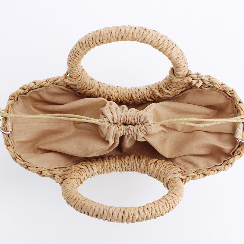 One-piece delivery: Simple style Instagram popular semi-circular hollow paper rope woven bag, beach handmade women's bag Specification image