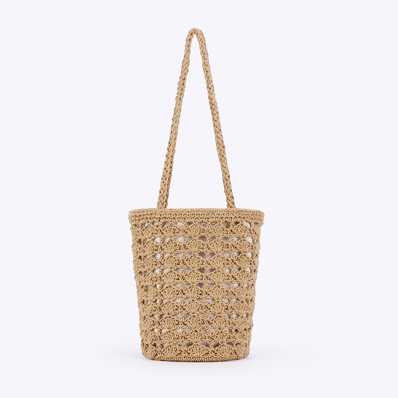 A new style of hollowed-out cotton rope woven bag is available for delivery. It is a versatile and niche ladies' bag for beach vacations, daily leisure, and commuting full image