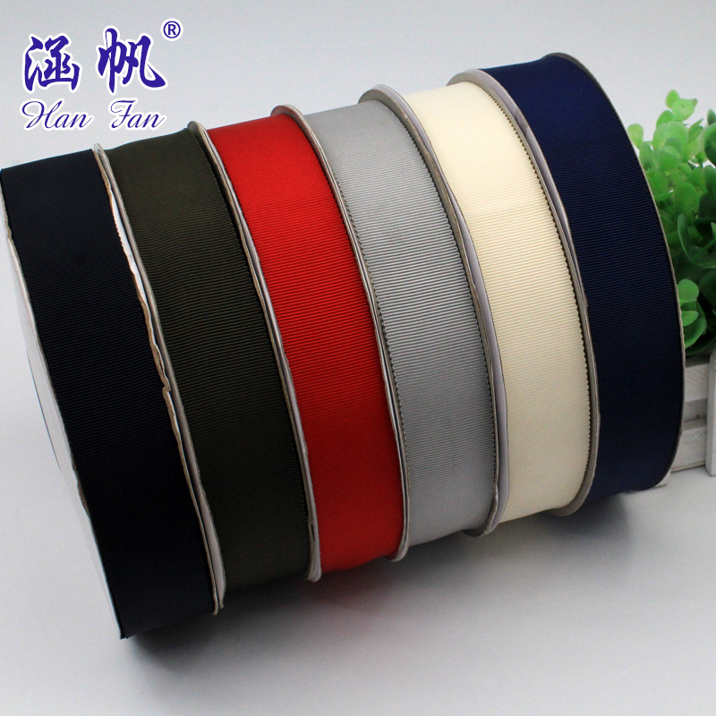 The manufacturer has a large quantity of multi-color polyester hat straps in stock. The gift box decoration can be made into a solid color woven strap with a bow