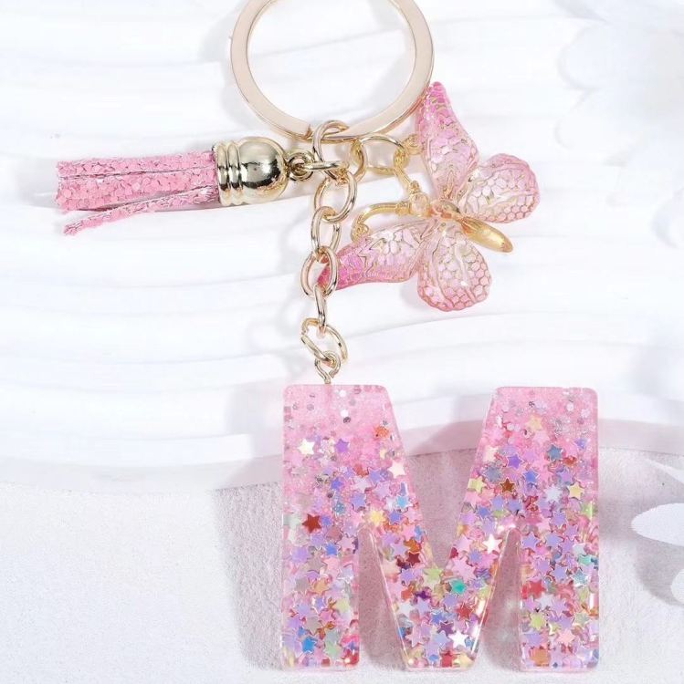 2024 Cross-border in-stock pink sequined resin keychain pendant with 26 English letters and butterfly tassel accessory