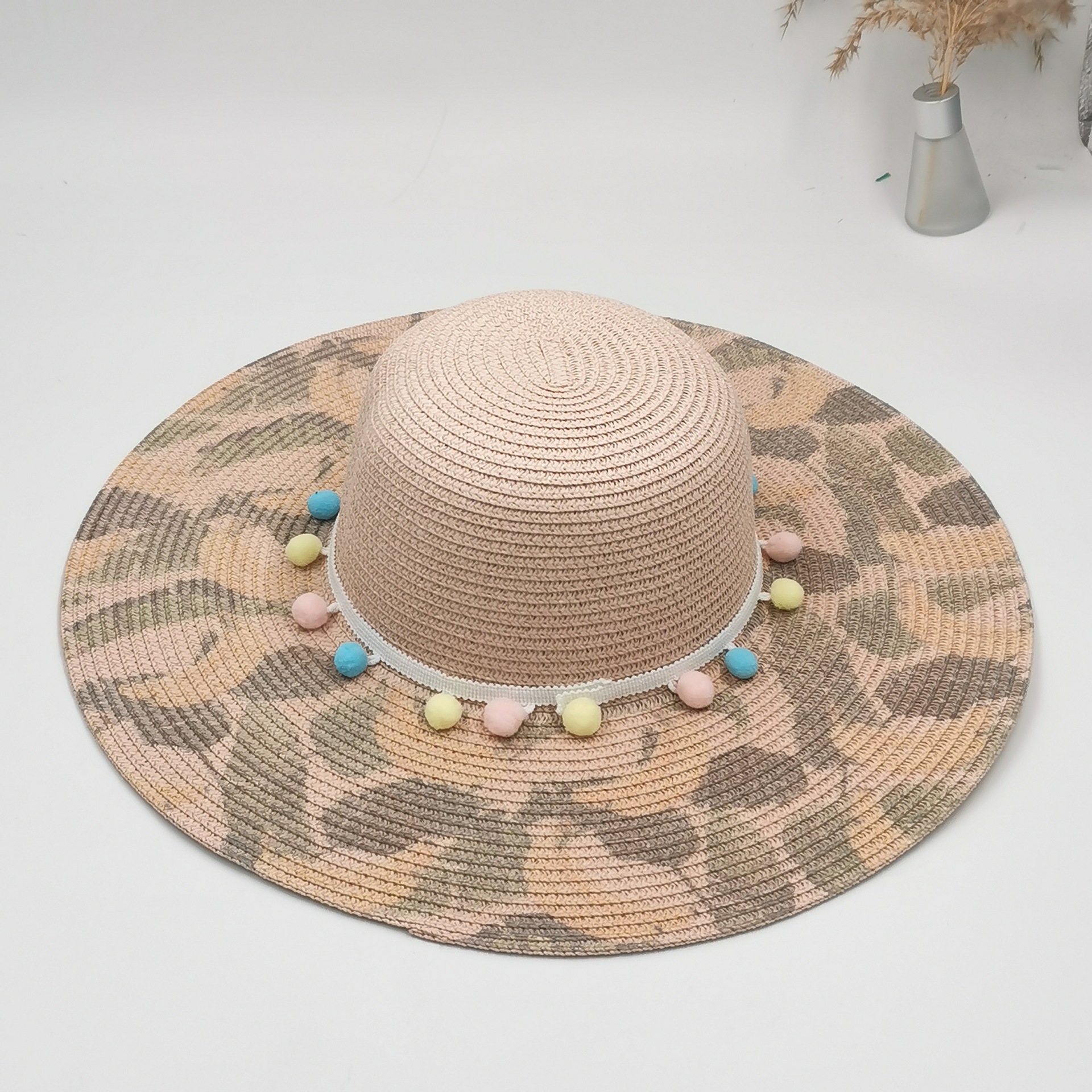 Wholesale of spring and summer outdoor wide-brimmed ribbon sun hats, pp silk hats, women's printed pom-pom hats and fisherman hats details Picture