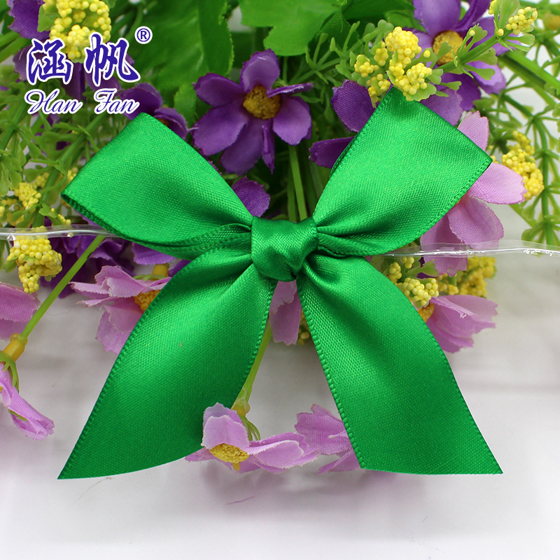 Professional custom-made bows, handcrafted bows with polyester bands and transparent tied silk bows