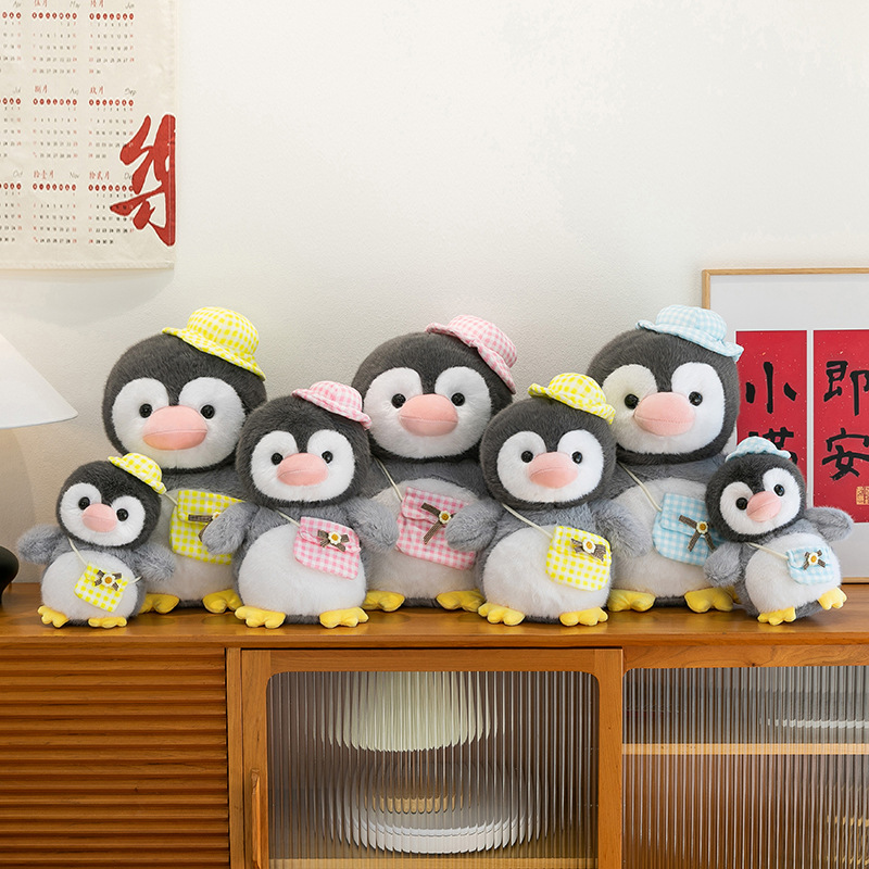 New cross-border super cute penguin team plush toy figurines, adorable shoulder bags, goose dolls, Ocean Park gifts details Picture