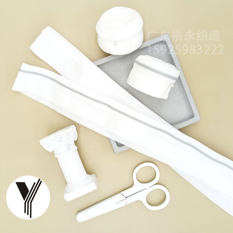 The manufacturer wholesals folded edge straps, elastic straps, elastic webbing, black and white jacquard three-dimensional fleece, and soft rolled edge strips