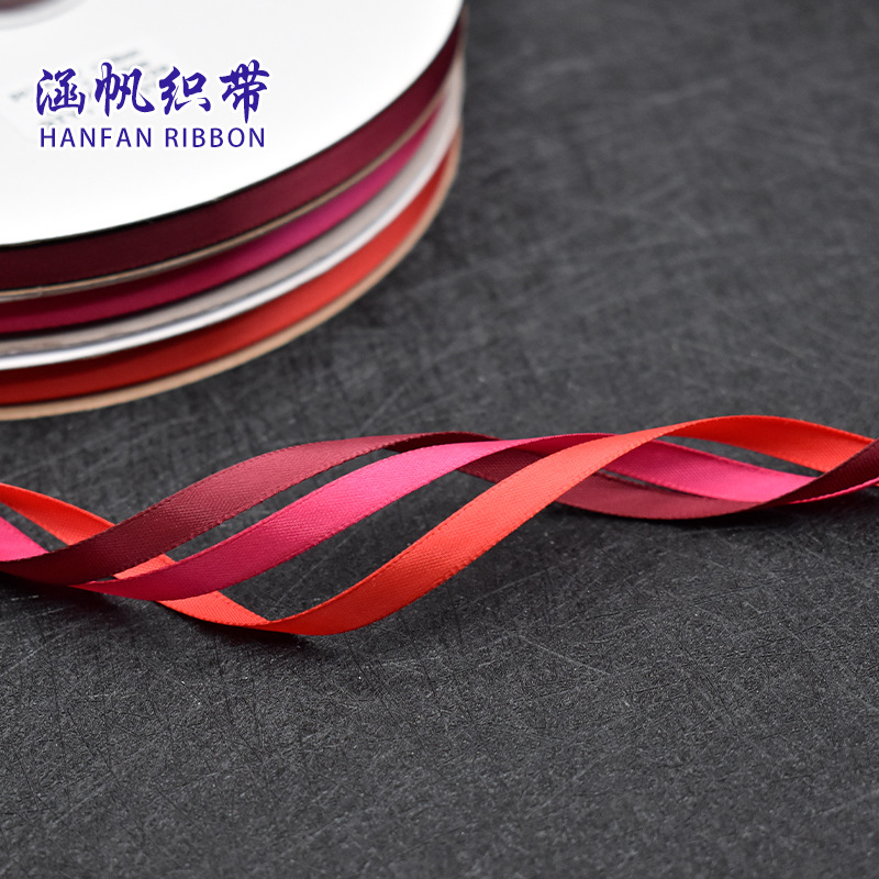 Black and grey gift box with green, blue, white and yellow ribbon bow, high-end packaging souvenir gift box, gift box details Picture