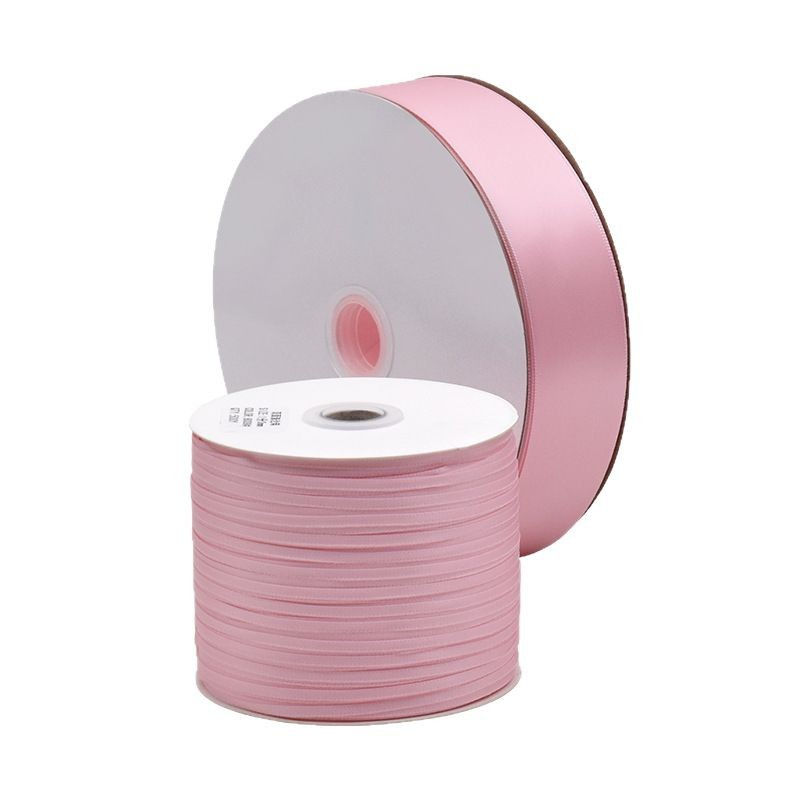 Pink ribbon ribbon roll decorative items, handcrafted materials, wedding and festival fabric decorations, DIY accessories Application Scenario