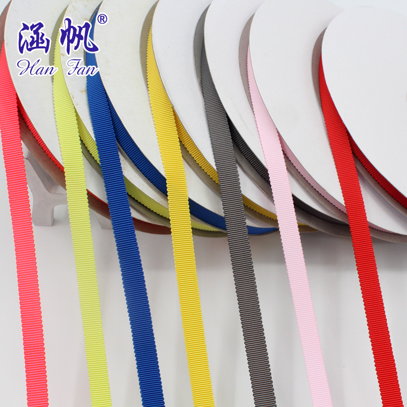 The manufacturer offers a large quantity of 1cm multi-color polyester hat strap with a special discount. The gift box decoration can be made into a solid color woven strap with a bow Specification image