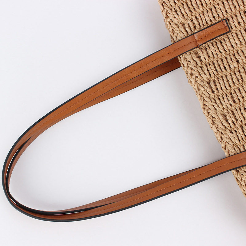 Brown leather hand-held bag with straw weaving, a small crossbody bag with artistic weaving and crocheted silver thread spliced together Item Picture