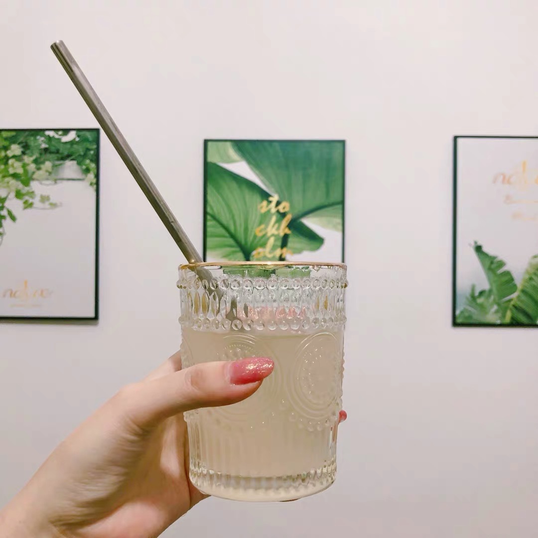 Wholesale of vintage embossed gold edge glass cups, round sunflower water cups, cold drink cups, milk tea shop juice cups details Picture