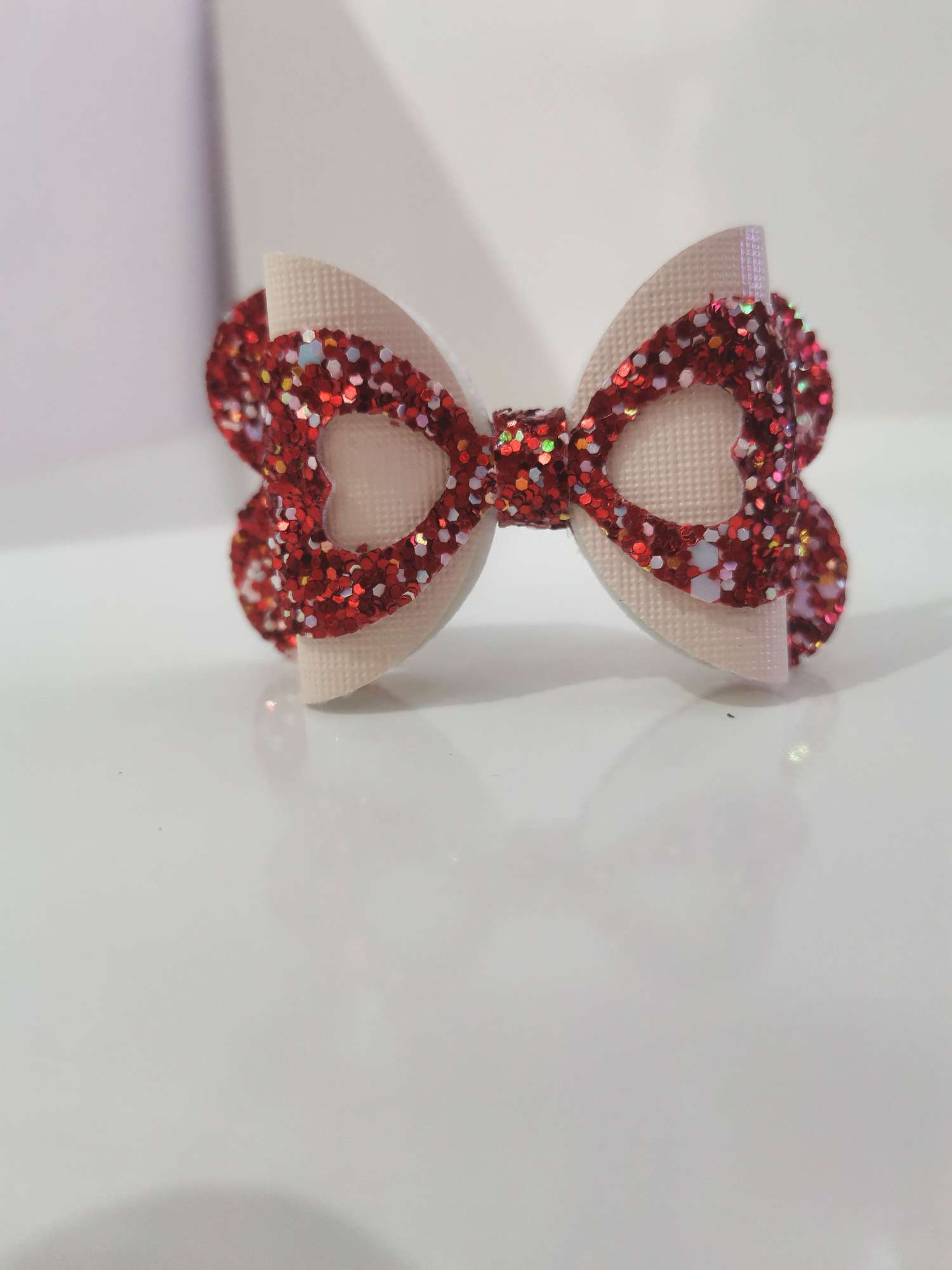 Ceramic disc hollowed-out heart knot