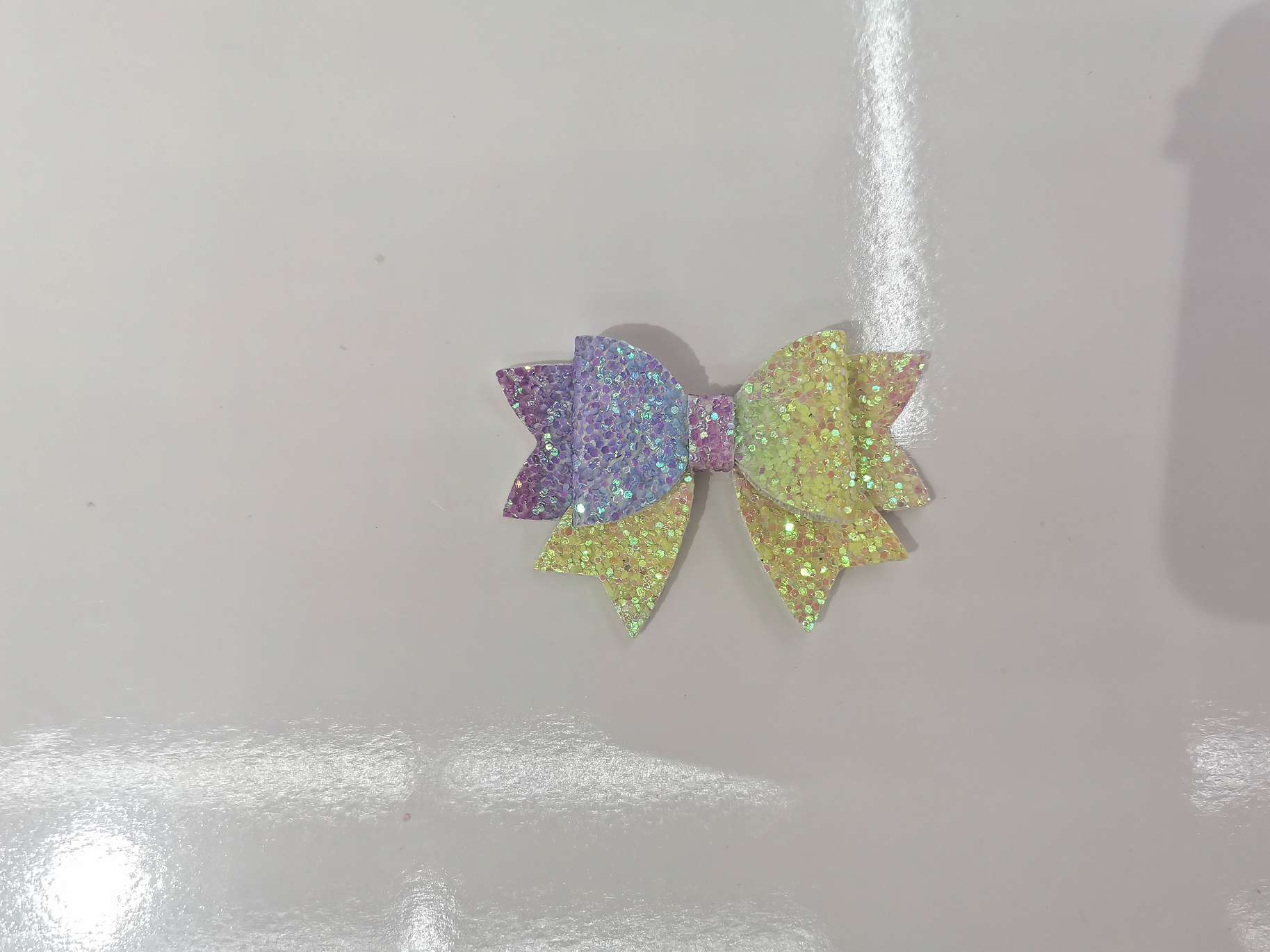 Three-layer ceramic swallowtail bow Item Picture