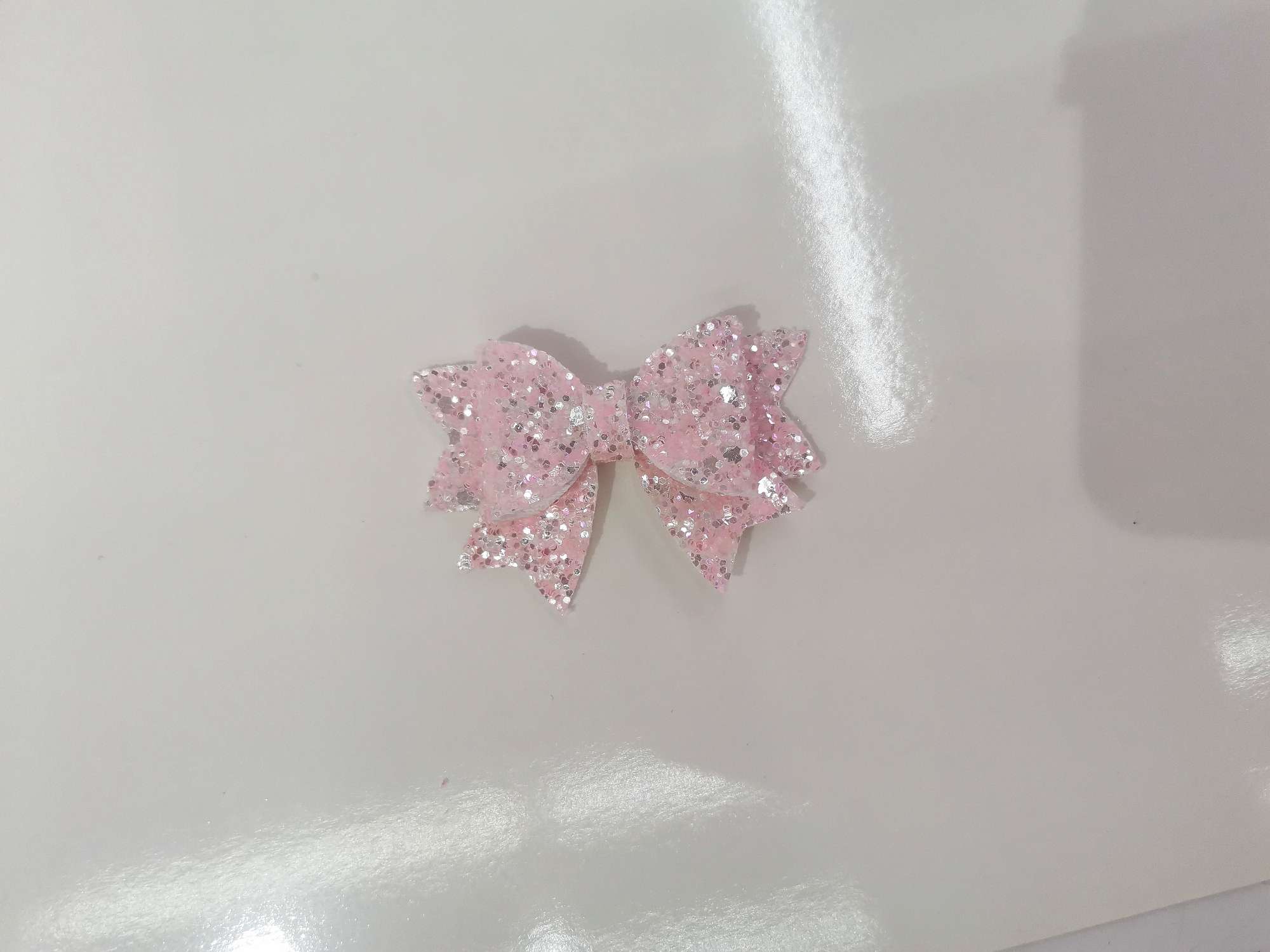 Three-layer ceramic swallowtail bow