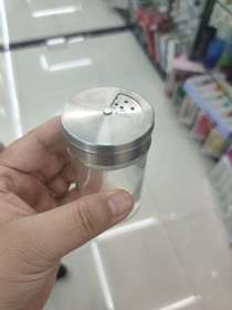 Transparent glass spice bottle
