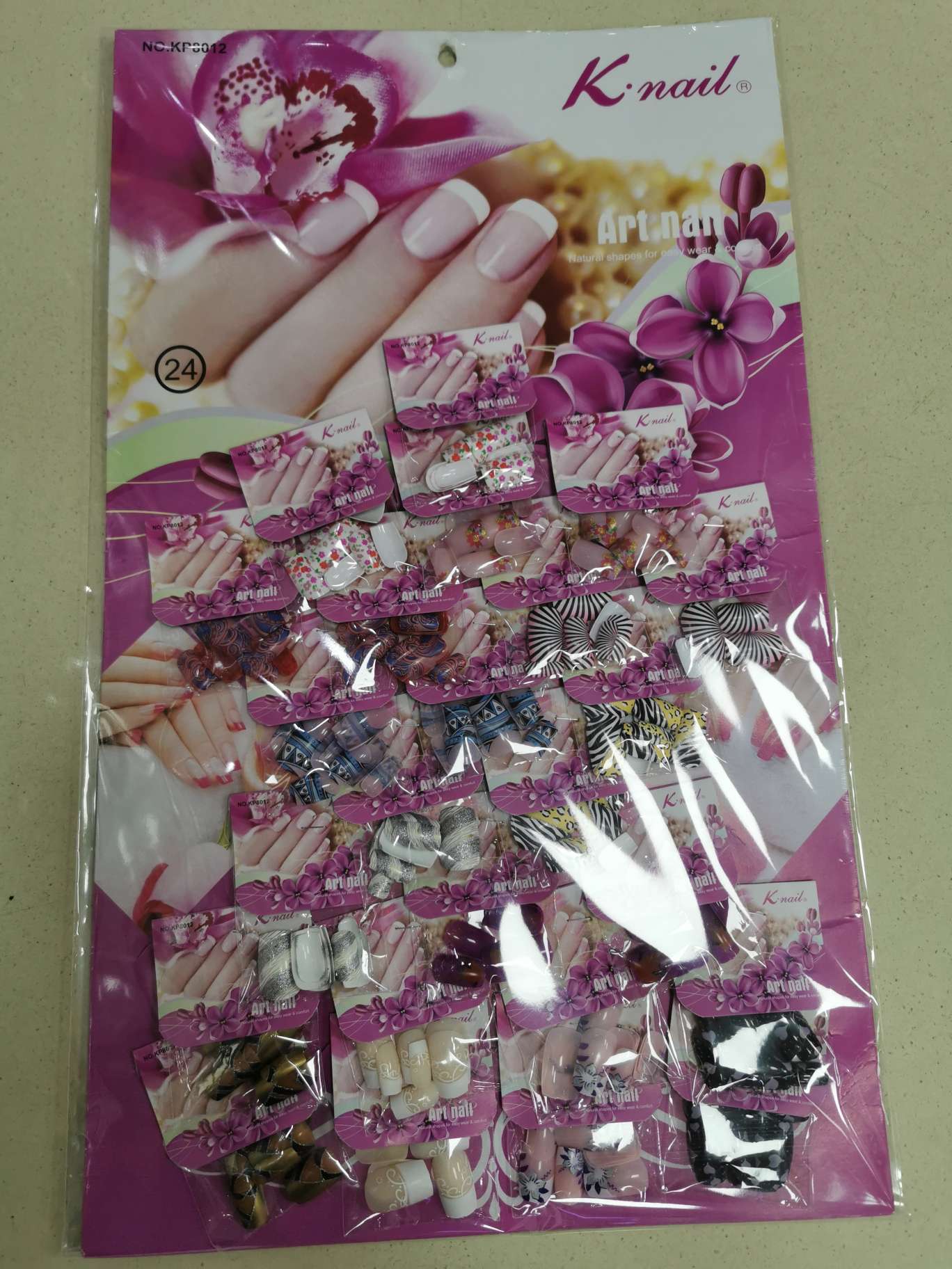 24挂花甲，进口ABS材料. 12片每小包，花色时尚，量大可自选