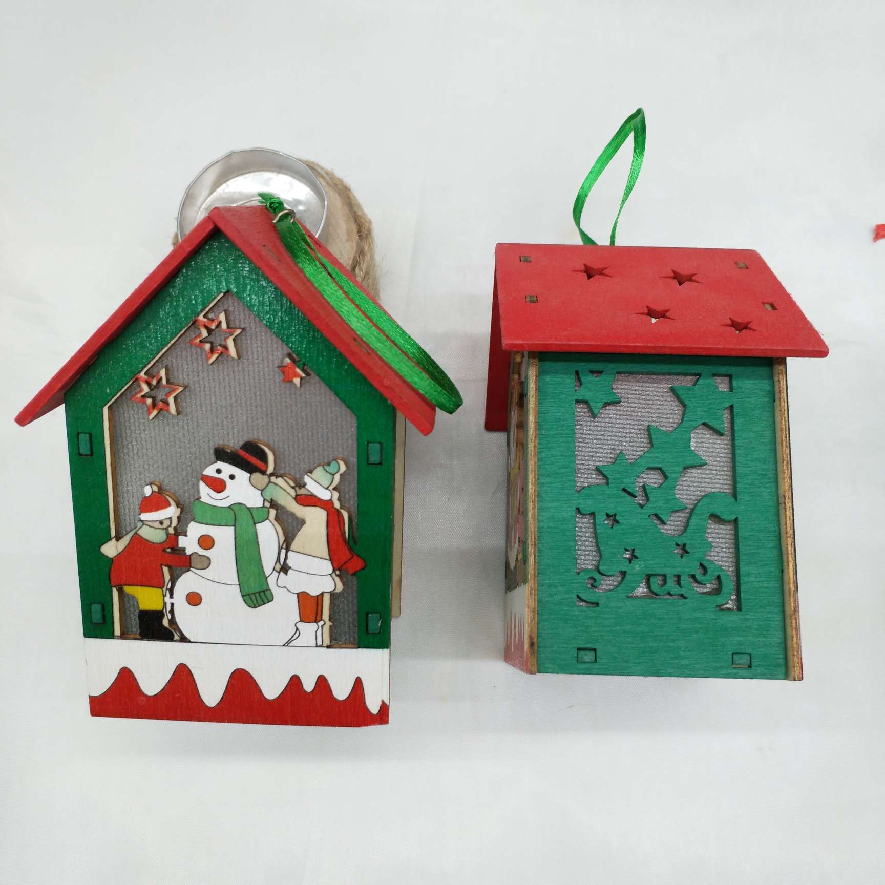 Wooden Christmas pendants for houses with lights and decorative accessories details Picture