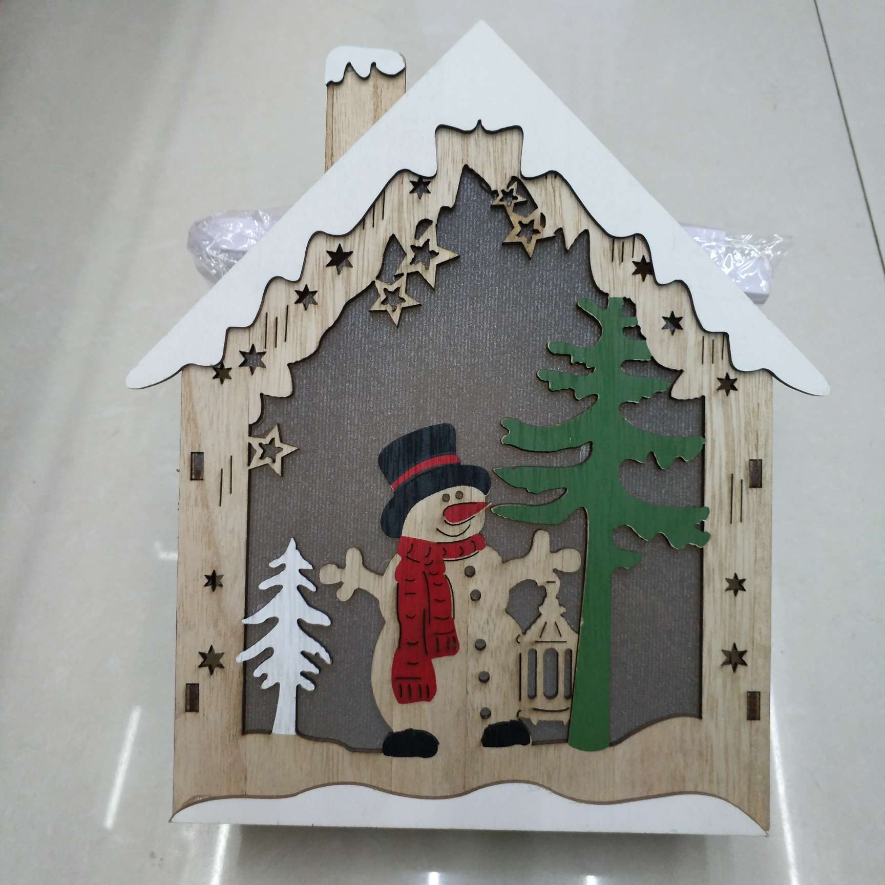 Wooden Christmas ornaments with lights, five-pointed stars, houses and lighthouses Specification image