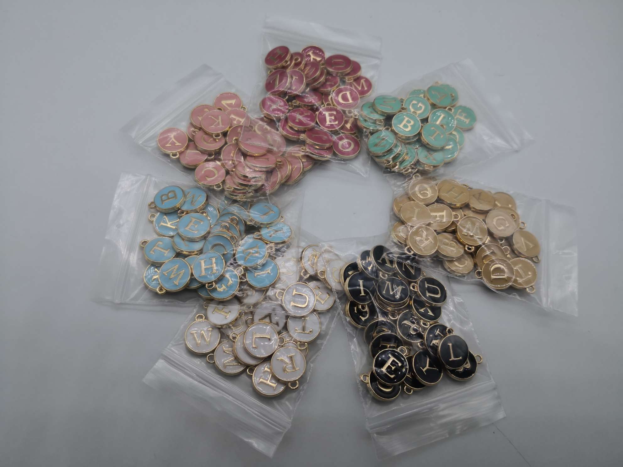 DLY jewelry accessories, eco-friendly English 26-letter 7-color stock, factory direct sales, large quantity, price negotiable