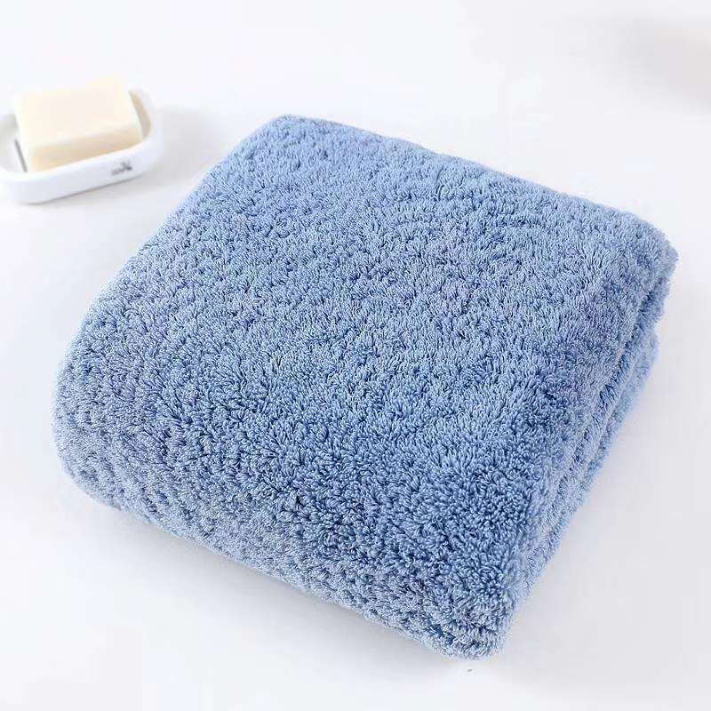 7036 Long Hair Bath Towel neatly folded in a bathroom setting