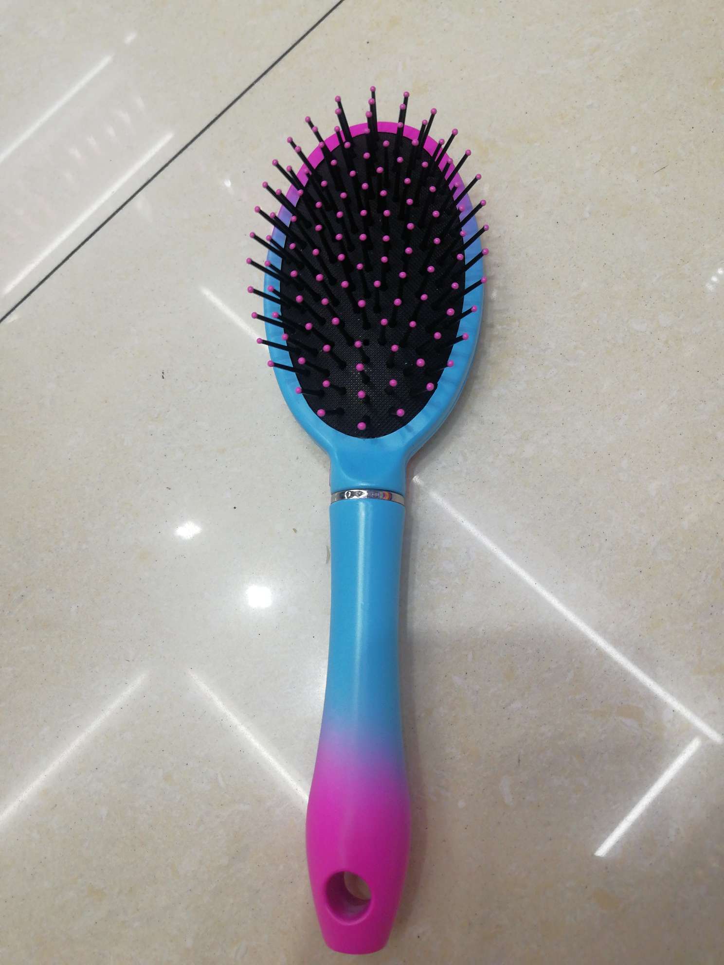 双色按摩梳子