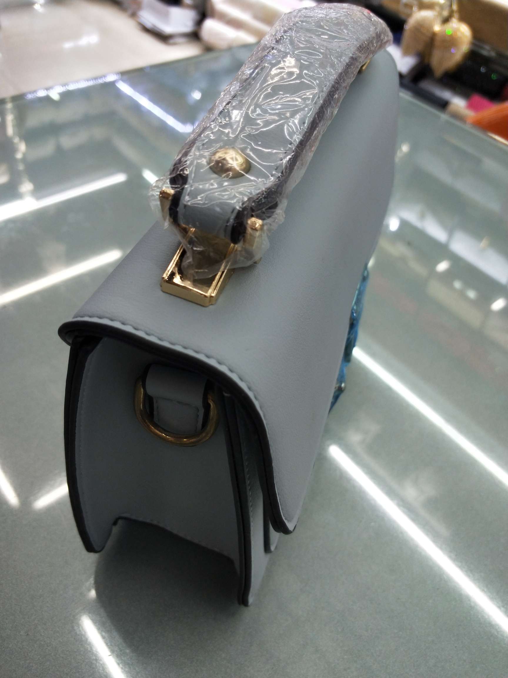 Interior layout of a women's handbag showing compartments
