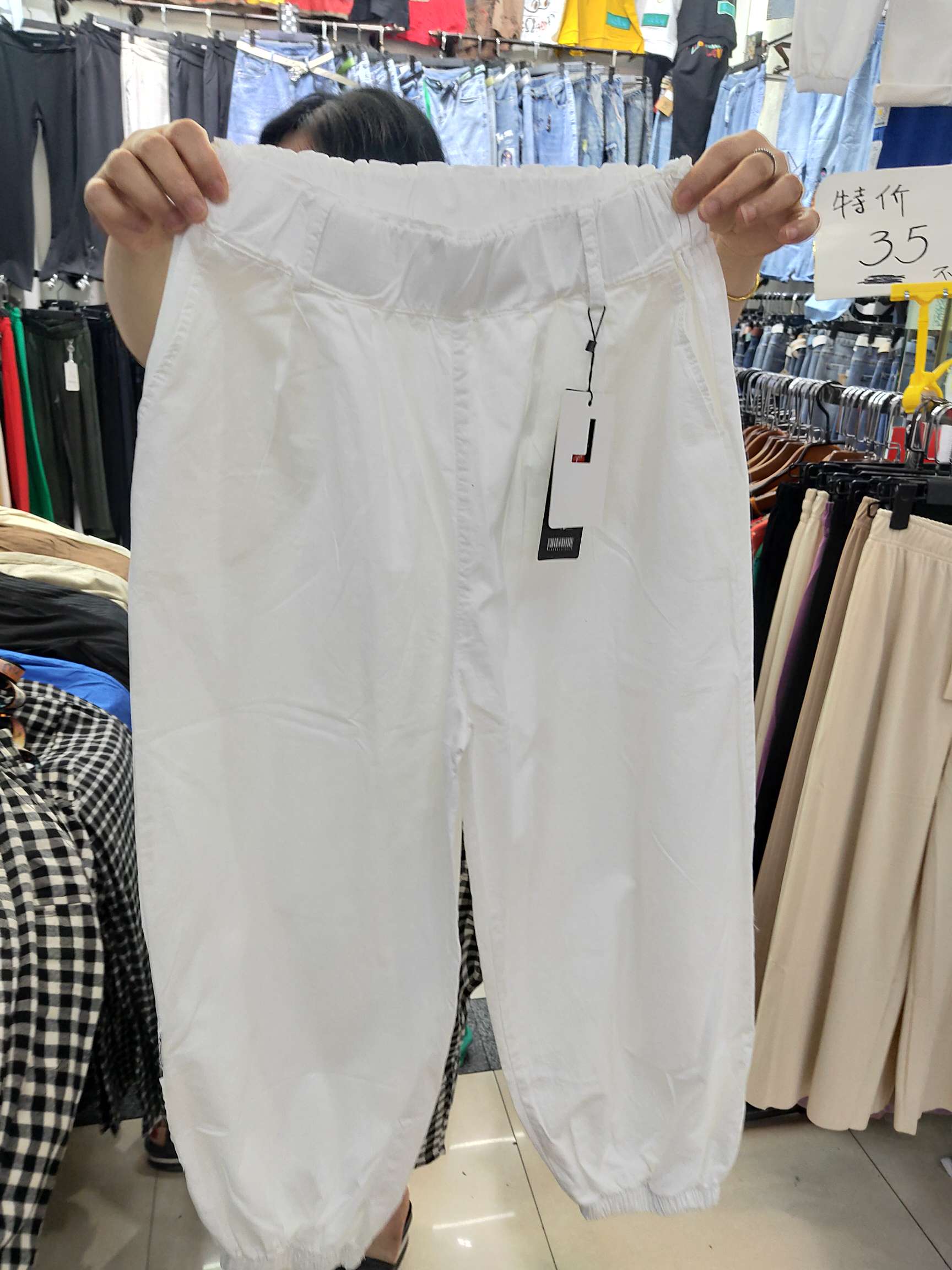 新款女裤白色口袋裤详情图1
