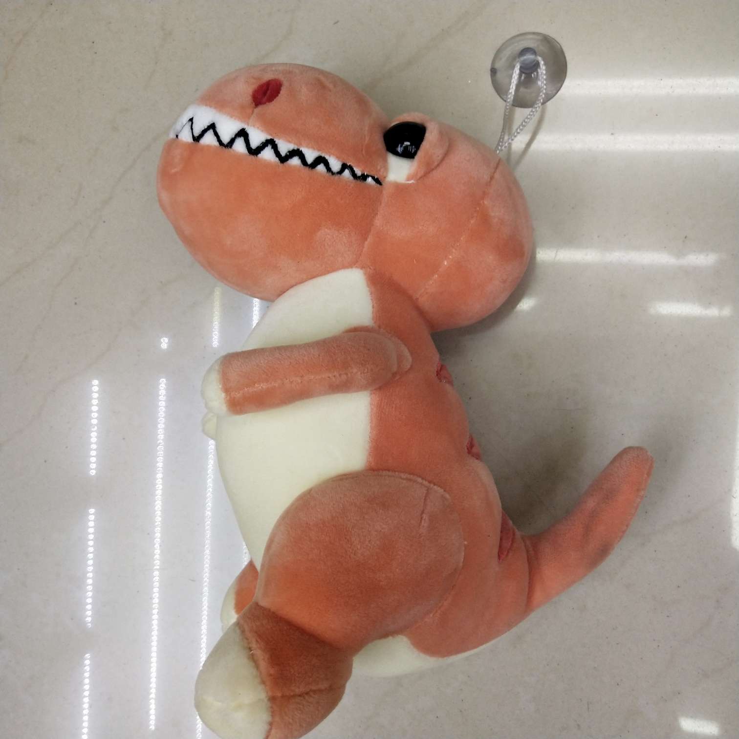 Dinosaur orange stuffed animal thumbnail