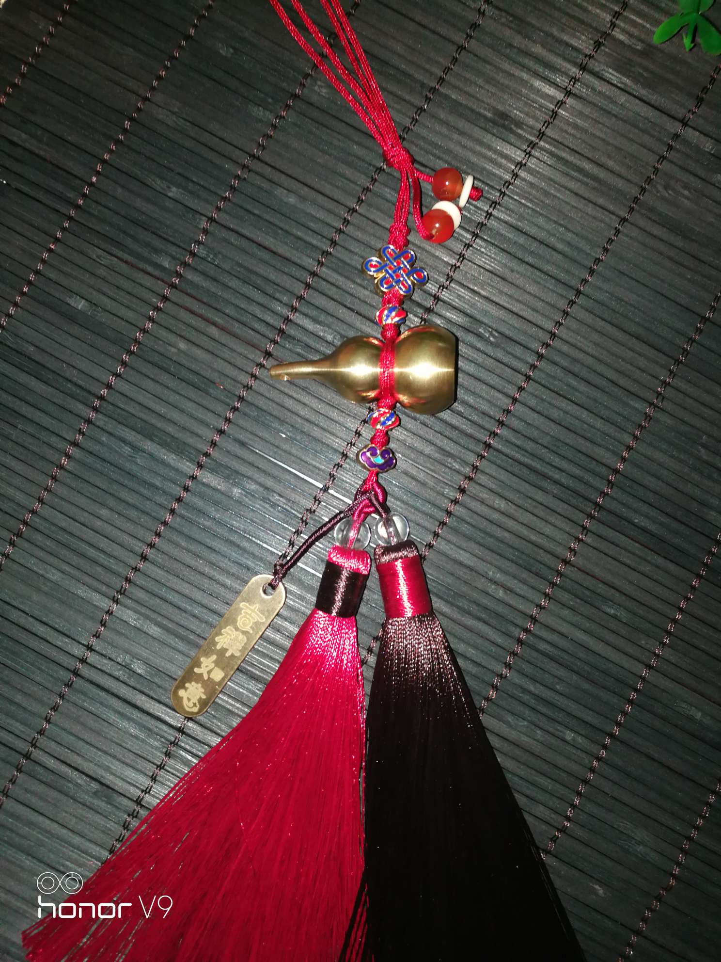 The copper gourd goes in and out safely on the vehicle. undefined