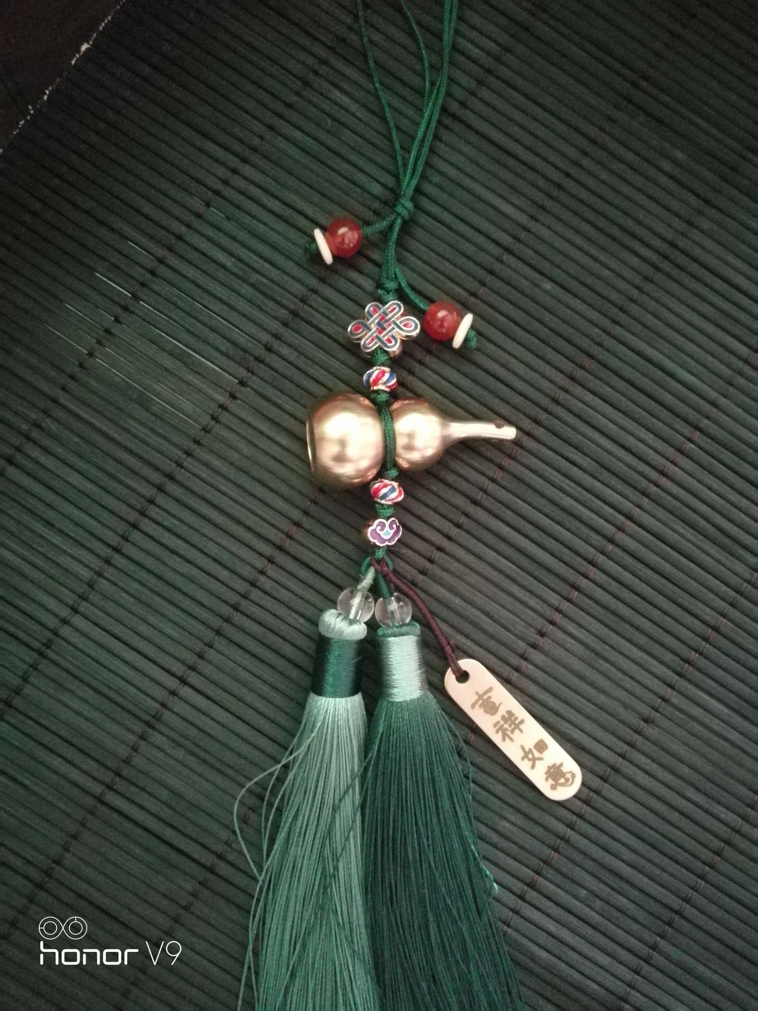 The copper gourd goes in and out safely on the vehicle. undefined
