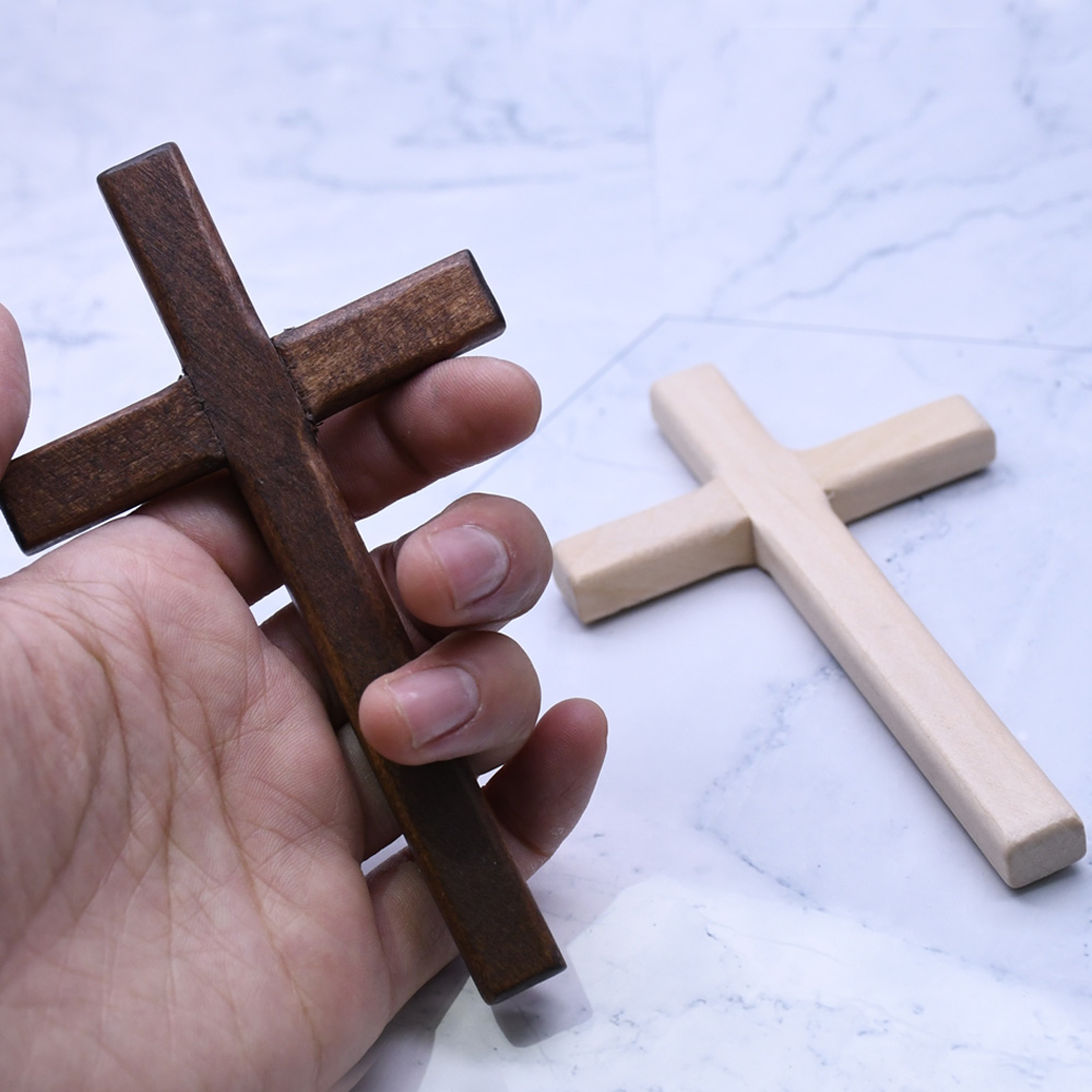 A 12*7cm handcrafted wooden hand-held cross gift undefined