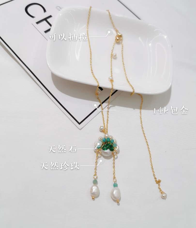 A hand-woven pendant necklace with natural freshwater pearls in the shape of a Chinese-style Peking Opera actress. It is a pure handmade necklace details Picture