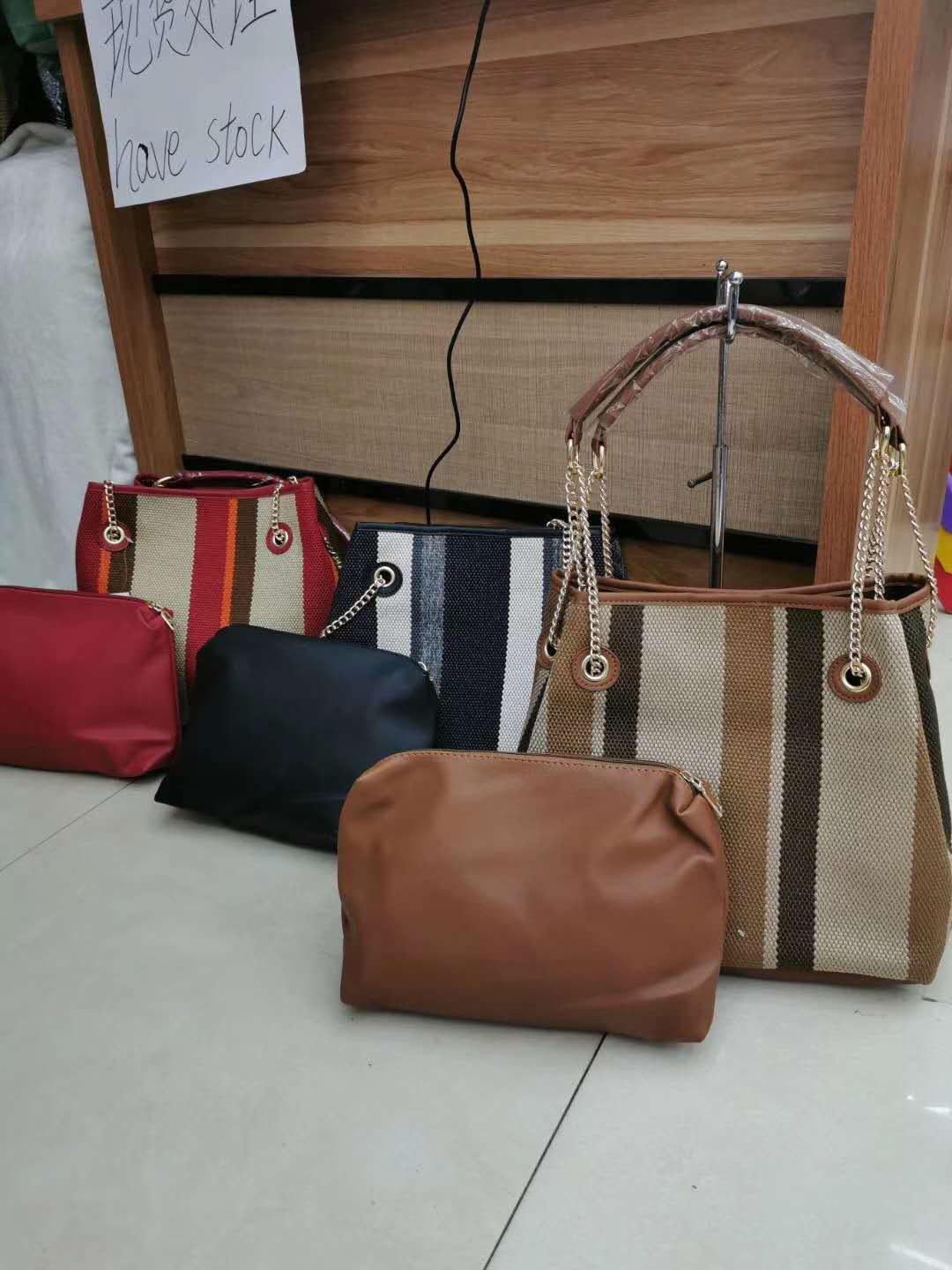 A two-piece bag for women, carried across the body