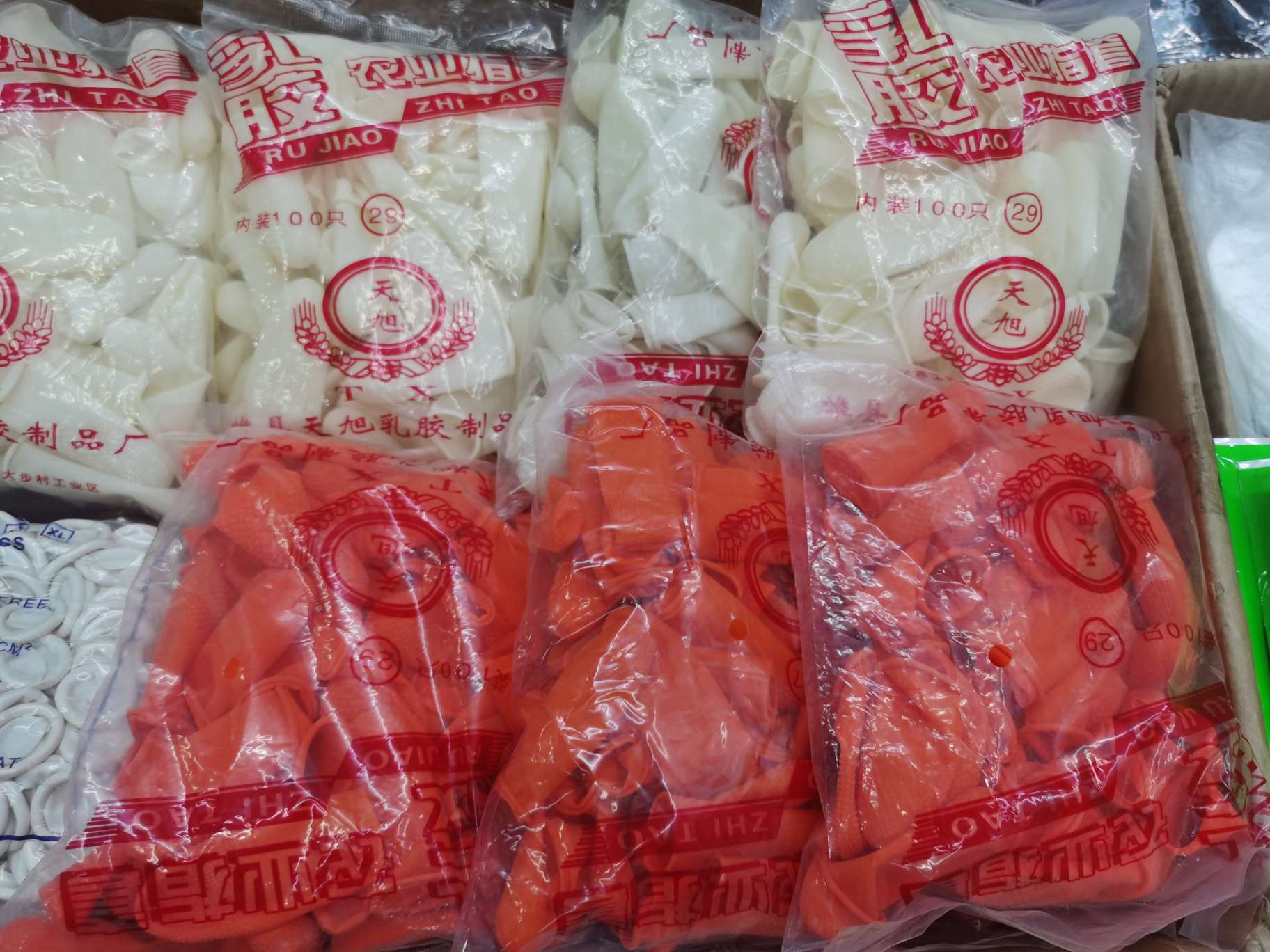 Latex finger cover, Tianxu, 27-29 white orange